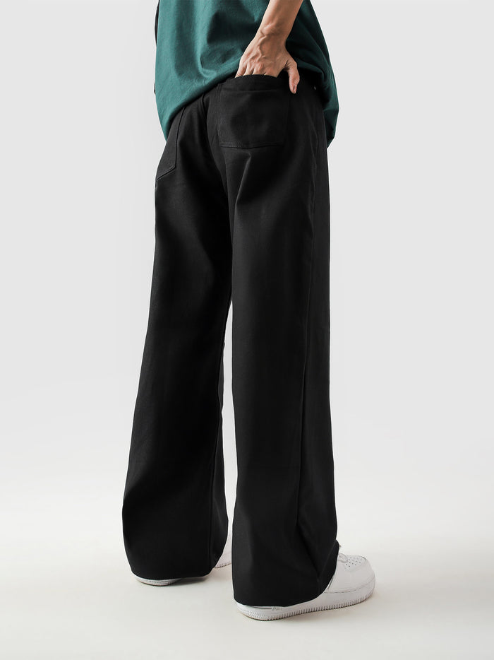 CORE denim black jeans female model front view streetwear Pakistan – GROOVY