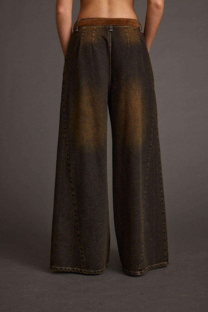 Detail shot of the Dakota Washed Black Wide Leg Jeans highlighting the wide-leg elements.