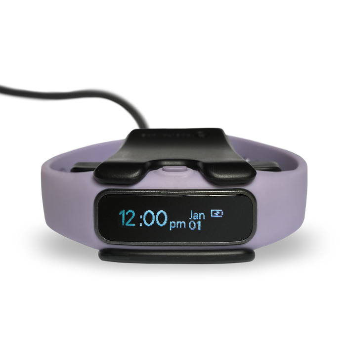 A purple Extra Charging Base: Keen2 with a clock on it.