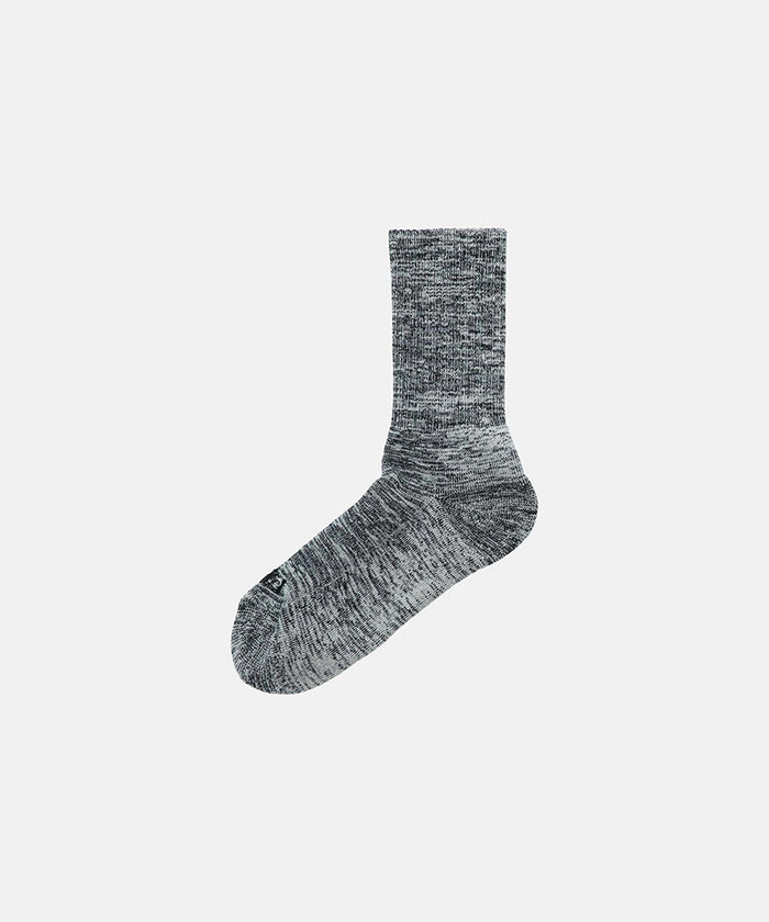 Ash colored Gramicci Hemp Blend Sock against a light-tone background.