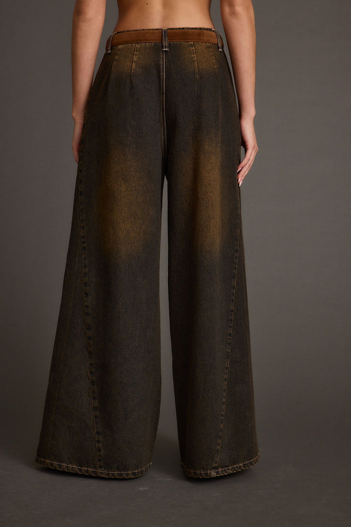 Close-up of the Dakota Washed Black Wide Leg Jeans showcasing the fabric texture and design details.
