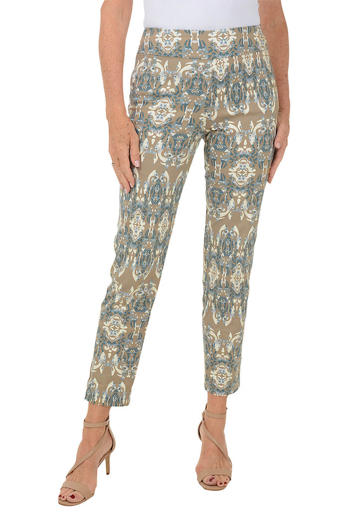A front shot of a model wearing a pair of pull-on ankle pants with an elasticized waistband and a damask mosaic print.
