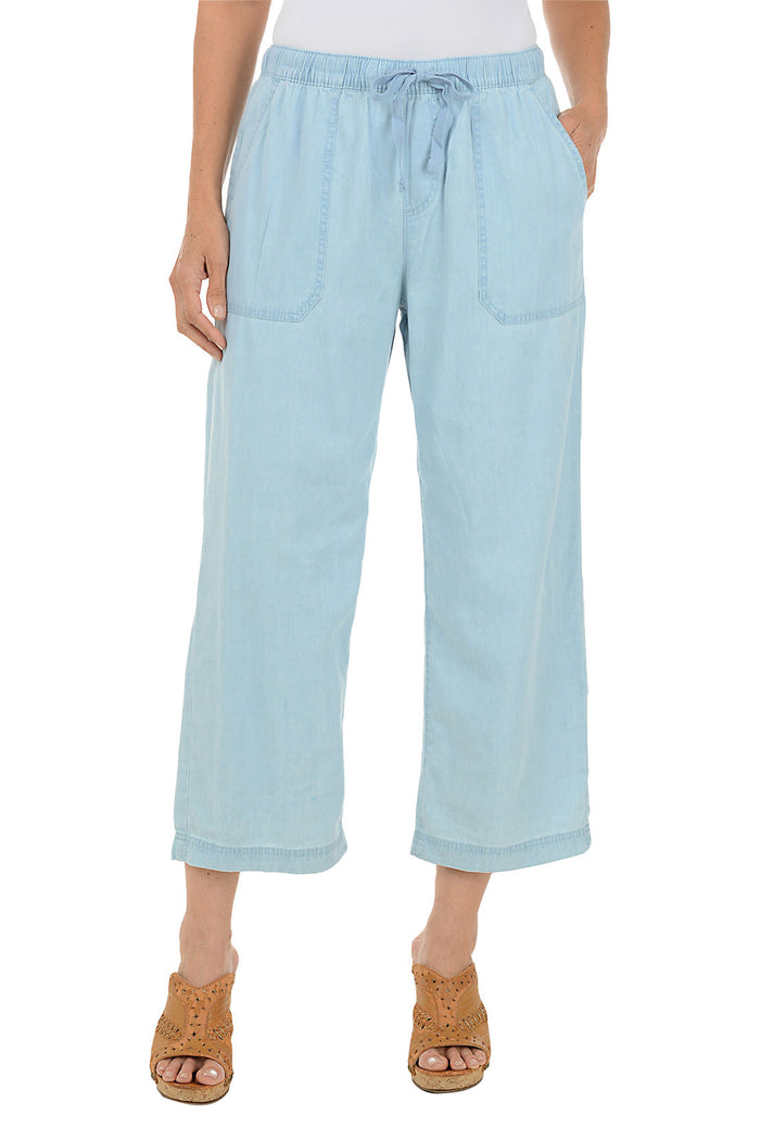 Light blue pants worn by a person on a white background.