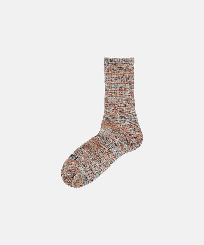 Amber colored Gramicci Hemp Blend Sock against a light-tone background.