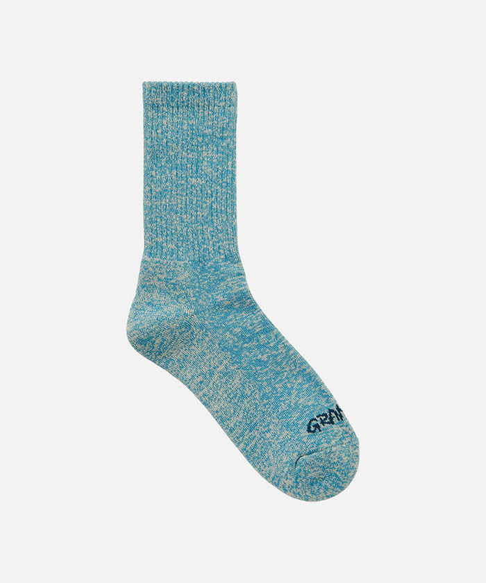 Blue Gramicci Hemp Blend Sock against a light-tone background.