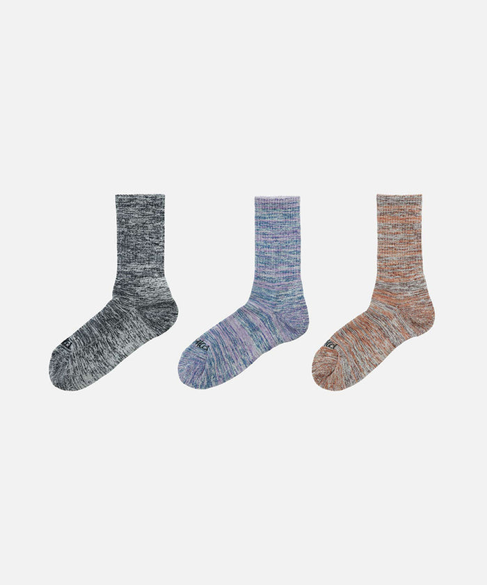 Three Gramicci Hemp Blend Socks in different colors on a white background.