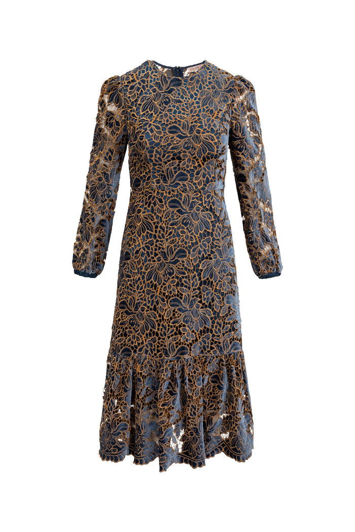 Patterned dress with long sleeves on a white background