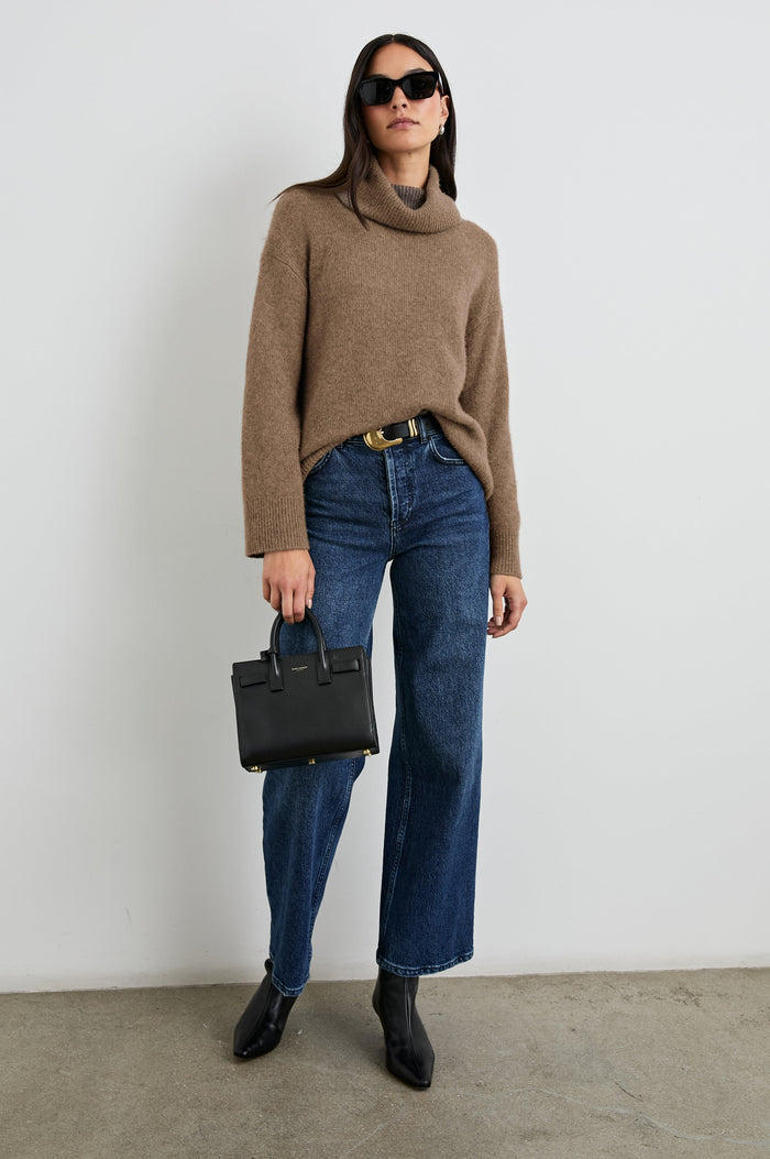 Nadine Long-Sleeve Sweater with a Roll Neck and Ribbed Trim in Oatmeal Colorway - Front View Featured on Model