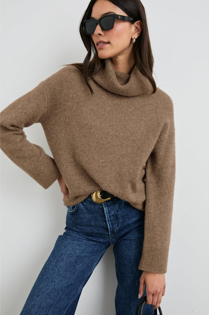 Nadine Long-Sleeve Sweater with a Roll Neck and Ribbed Trim in Oatmeal Colorway - Front Full Body View Featured on Model
