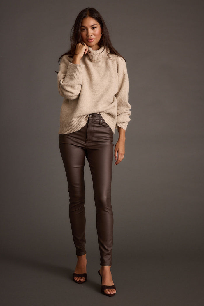 Detail shot of the Nixon Mocha Coated Pants highlighting the design elements.