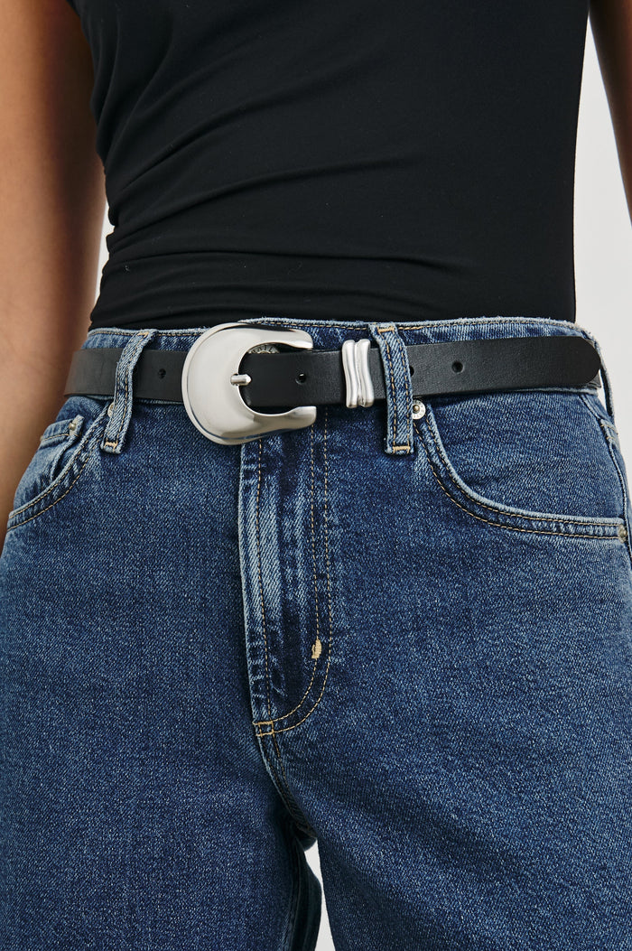 Rodeo Belt with a Black Leather Belt with Belt Loop and a Chunky Silver-Toned Buckle in Brown Gold Colorway - Front View Featured on Model