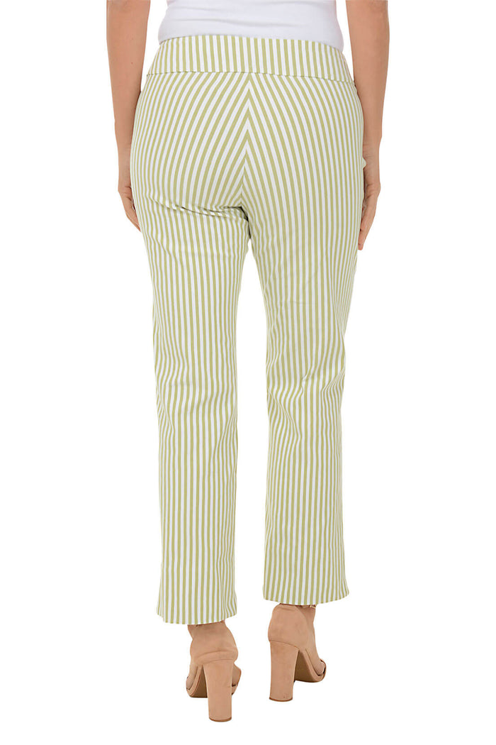 A back shot of a model wearing a pair of green striped flared ankle pants with an elastic waistband, flat front and back, and side slits on the hemline.