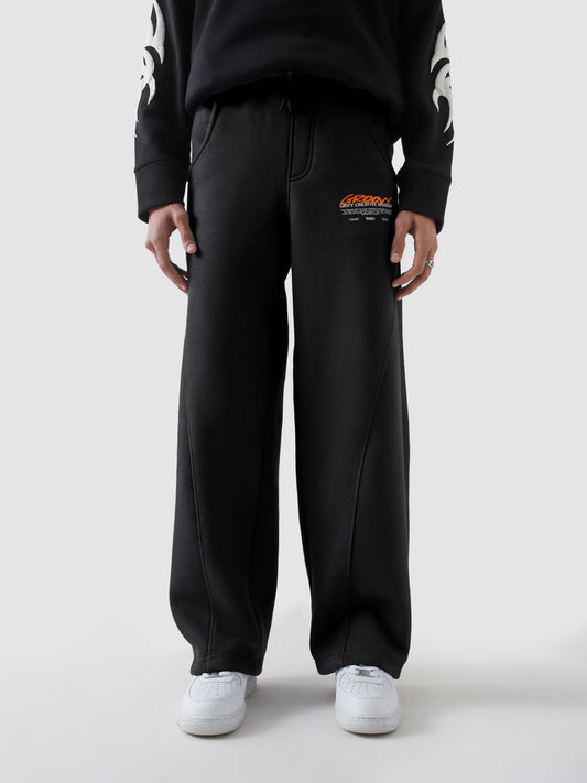 Unity VI black winter trouser male model half body lifestyle shot Pakistan – GROOVY