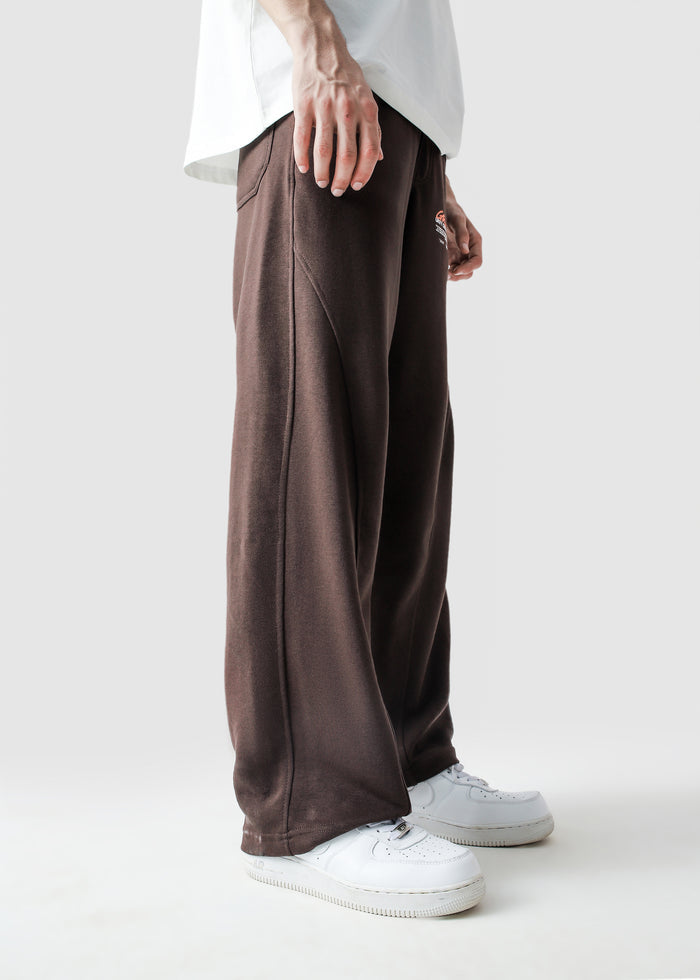 Mocha brown Unity VI pants male model back view baggy fit Pakistan – GROOVY